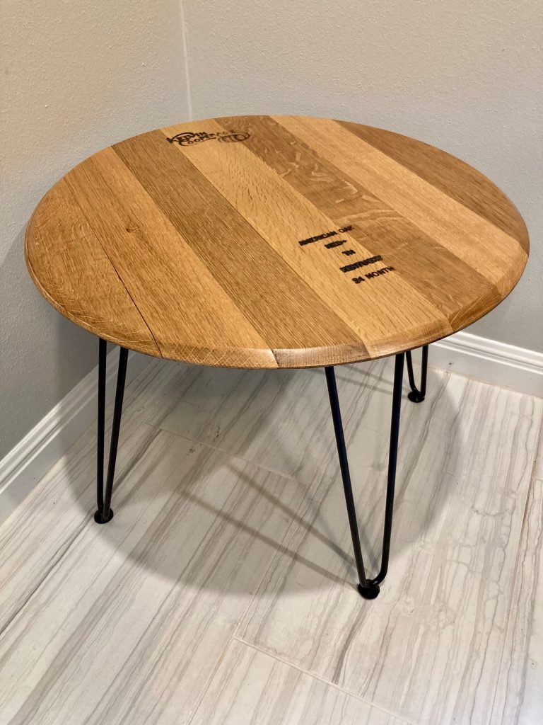 End table from whiskey or wine barrel head